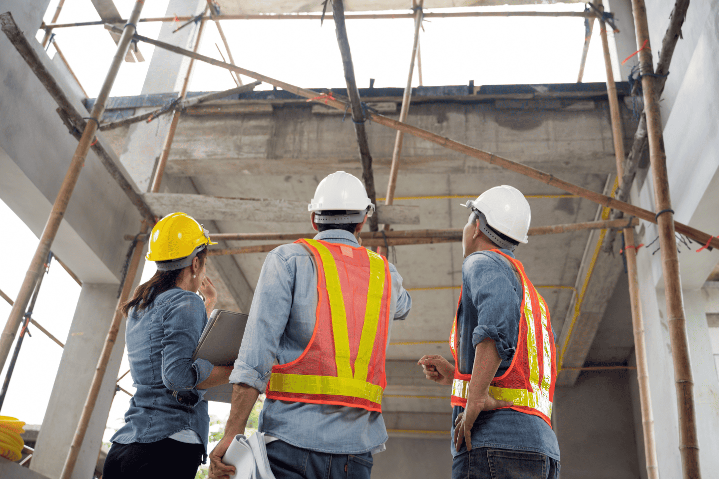 workmen discussing a job