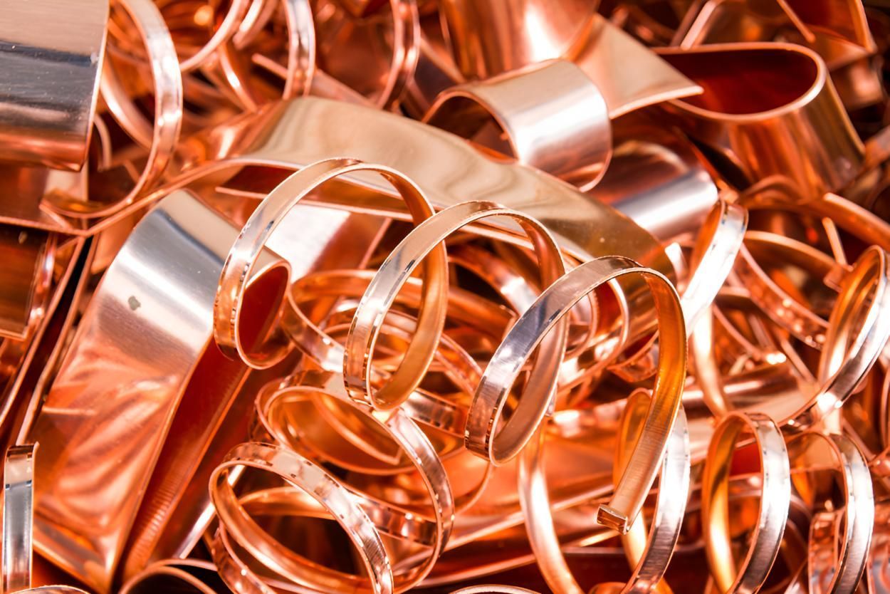 Pile of Copper Scrap is Sitting on a Table — Maryborough Recycling in Tin Can Bay, QLD