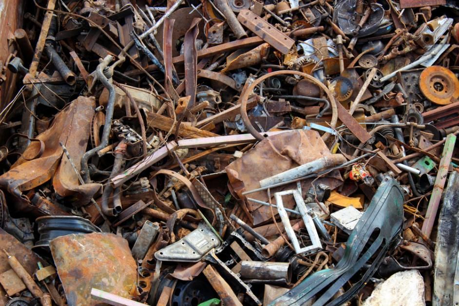 Pile of Rusty Metal is Sitting on the Ground — Maryborough Recycling in Boonooroo, QLD