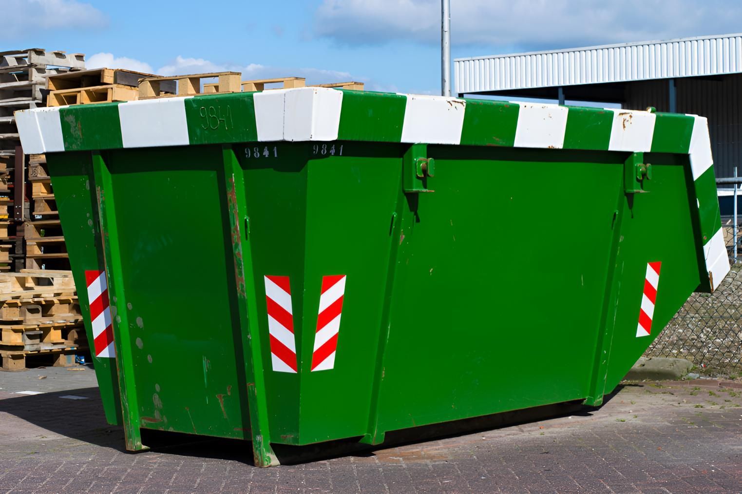 Green Dumpster With Red and White Arrows on It — Maryborough Recycling in Tin Can Bay, QLD