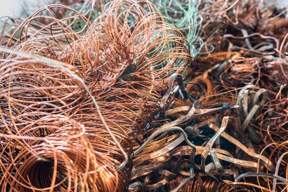 Pile of Copper Wire is Sitting on a Table — Maryborough Recycling in Maryborough, QLD