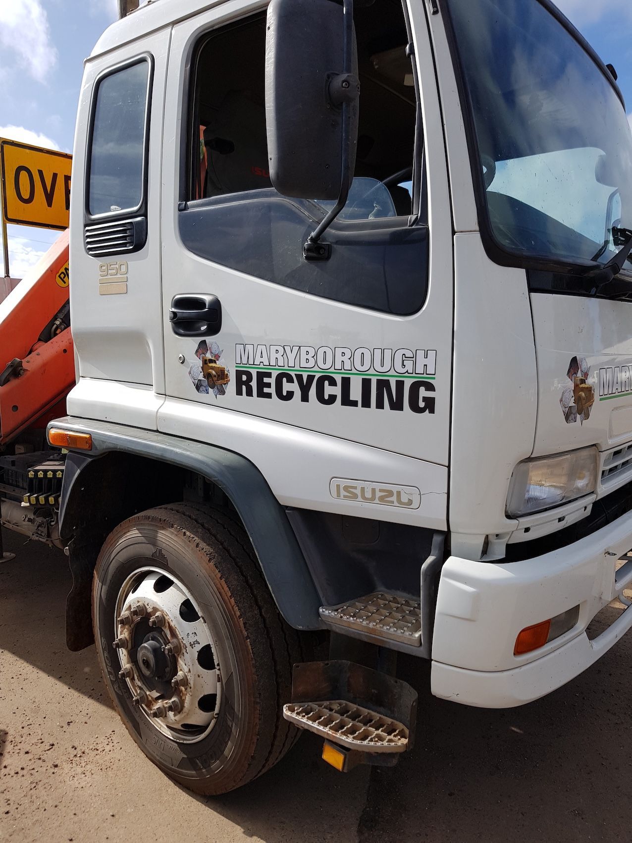Side View Of Crane Truck — Maryborough Recycling in Maryborough, QLD