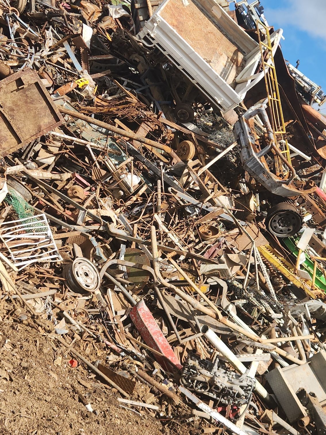 Pile of Scrap Metal is Sitting on the Ground — Maryborough Recycling in Maryborough, QLD
