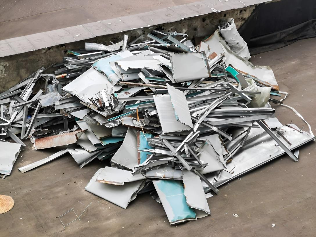 Pile of Scrap Metal is Sitting on the Ground — Maryborough Recycling in Maryborough, QLD