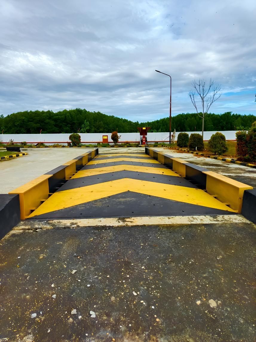 Yellow and Black Striped Weighbridge — Maryborough Recycling in Ban Ban Springs, QLD