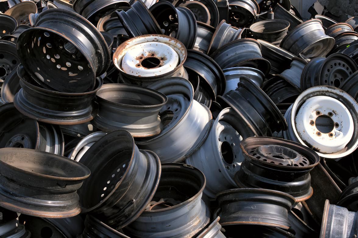 Pile of Wheels Are Stacked on Top of Each Other — Maryborough Recycling in Torbanlea, QLD