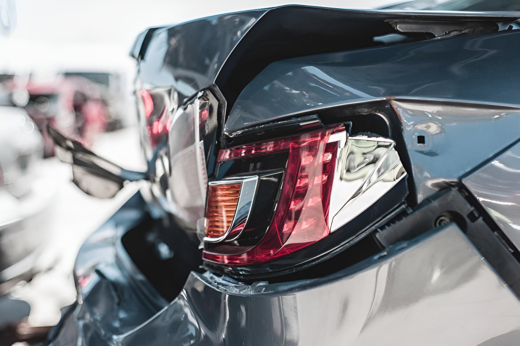 Close Up of a Damaged Car With a Broken Tail Light — Maryborough Recycling in Maryborough, QLD
