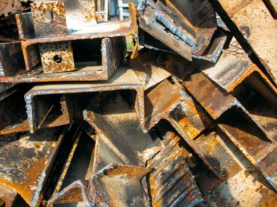 Pile of Rusty Metal is Sitting on the Ground — Maryborough Recycling in Maryborough, QLD