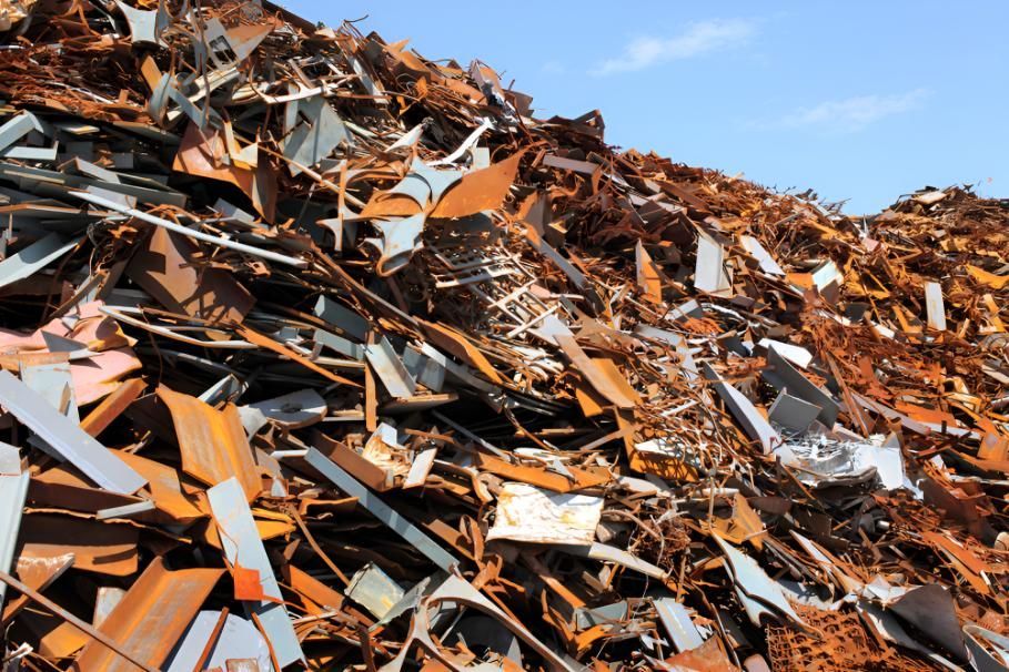 Pile of Scrap Metal is Sitting on Top of a Hill — Maryborough Recycling in Maryborough, QLD