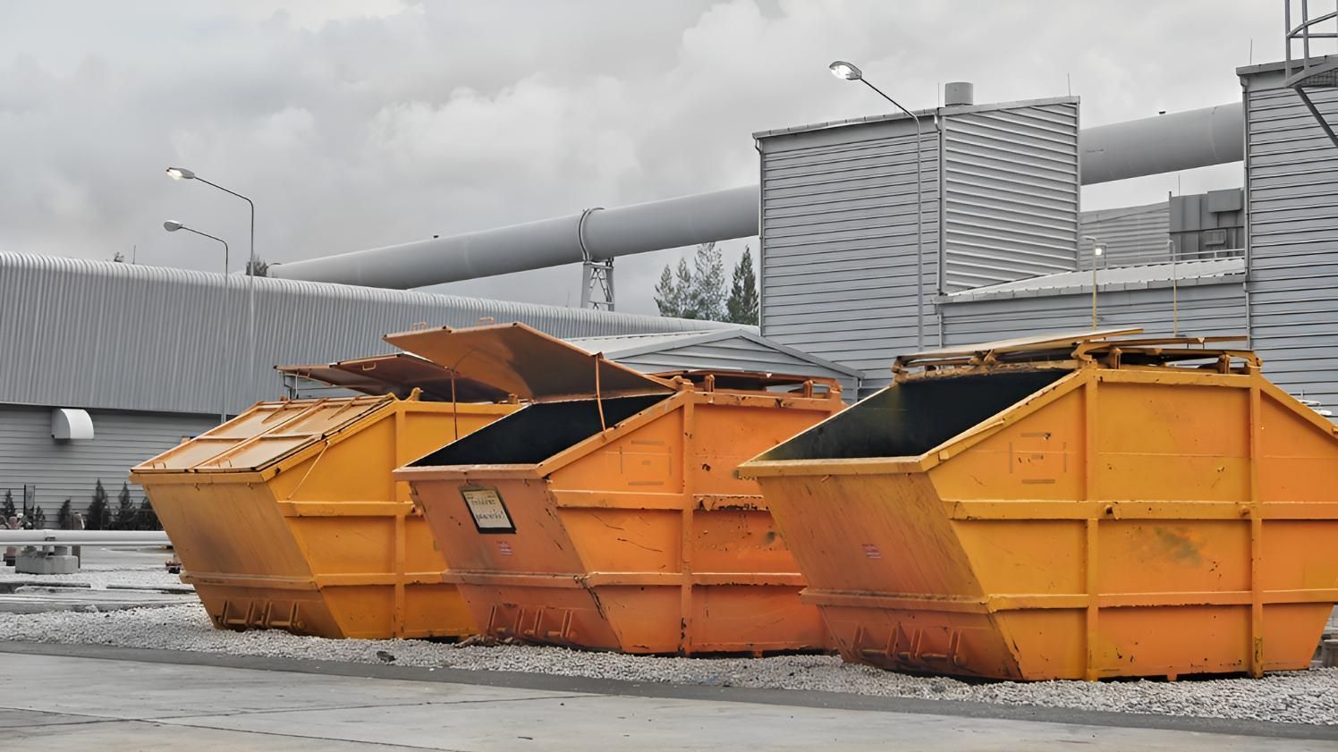 Row of Yellow Dumpsters — Maryborough Recycling in Gayndah, QLD