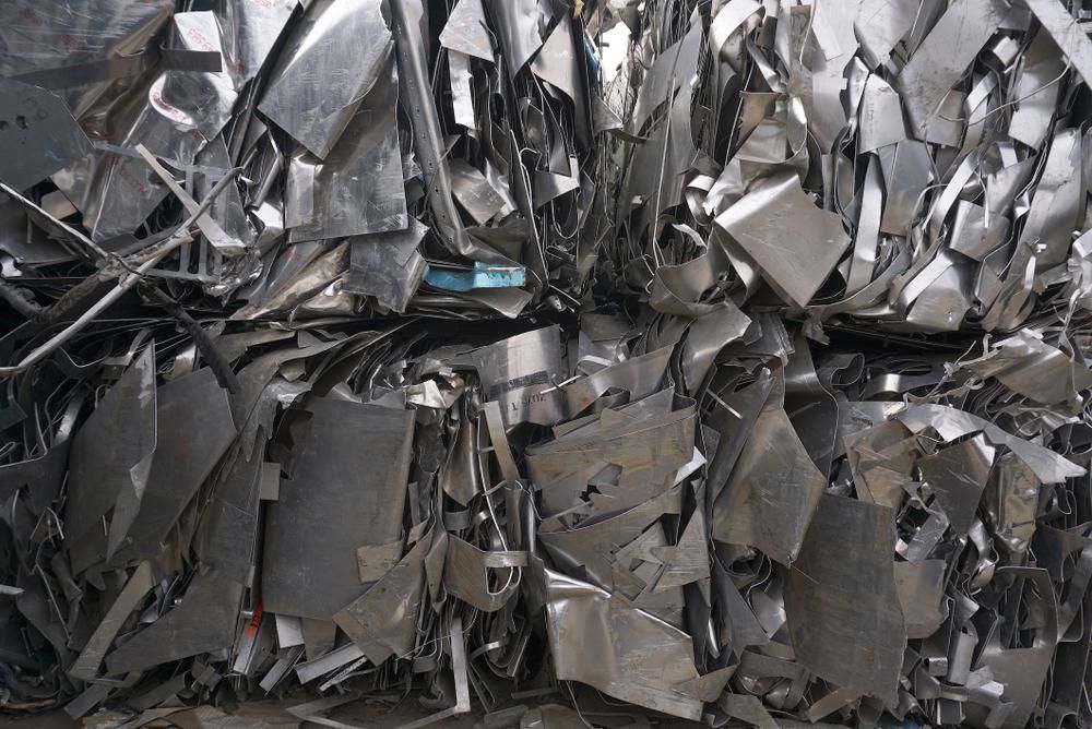 Pile of Scrap Metal is Sitting on Top of Each Other — Maryborough Recycling in Bauple, QLD