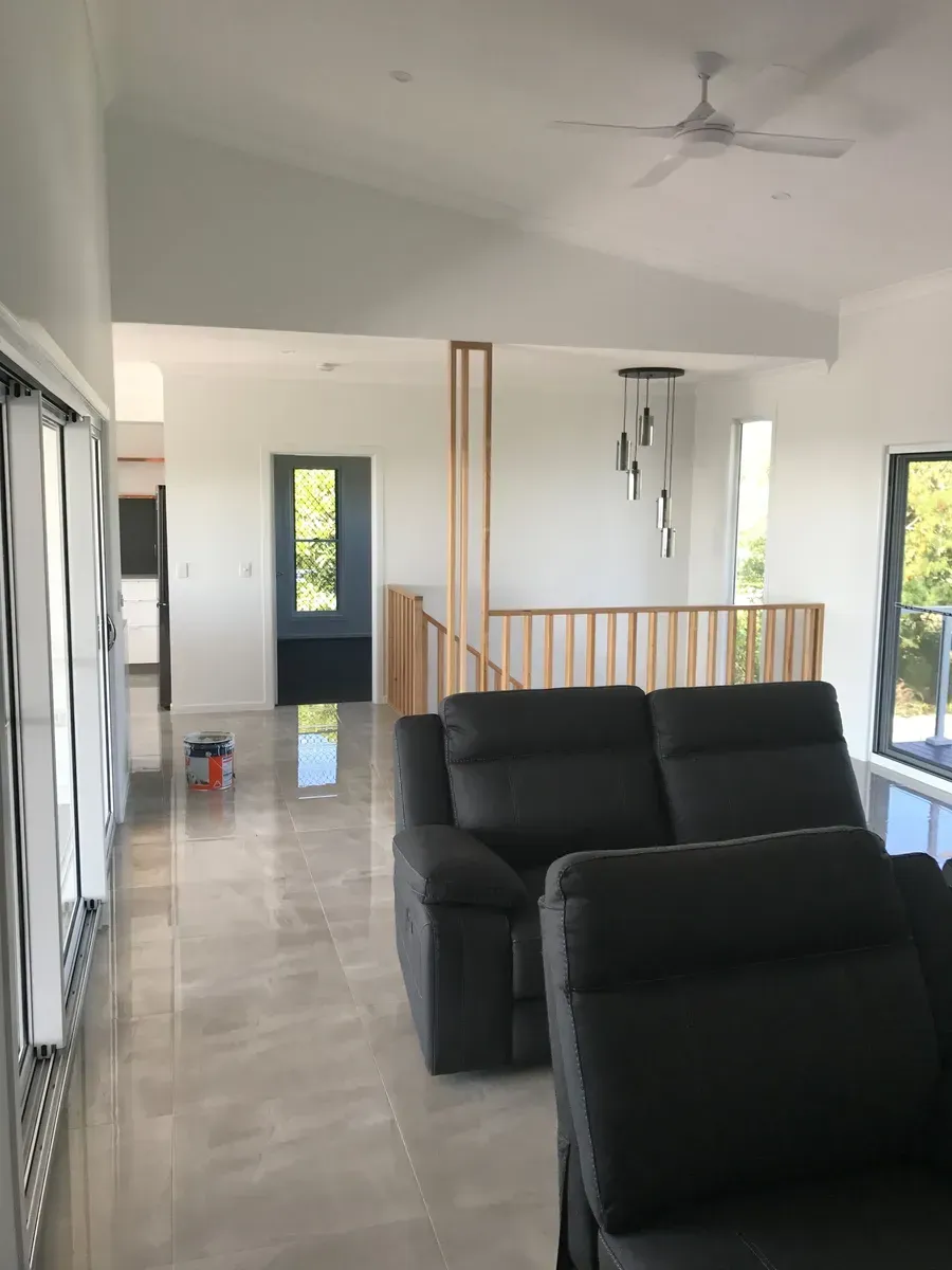Modern Living Room With Dark Gray Reclining Sofa — Keppel Coatings in Pacific Heights, QLD 