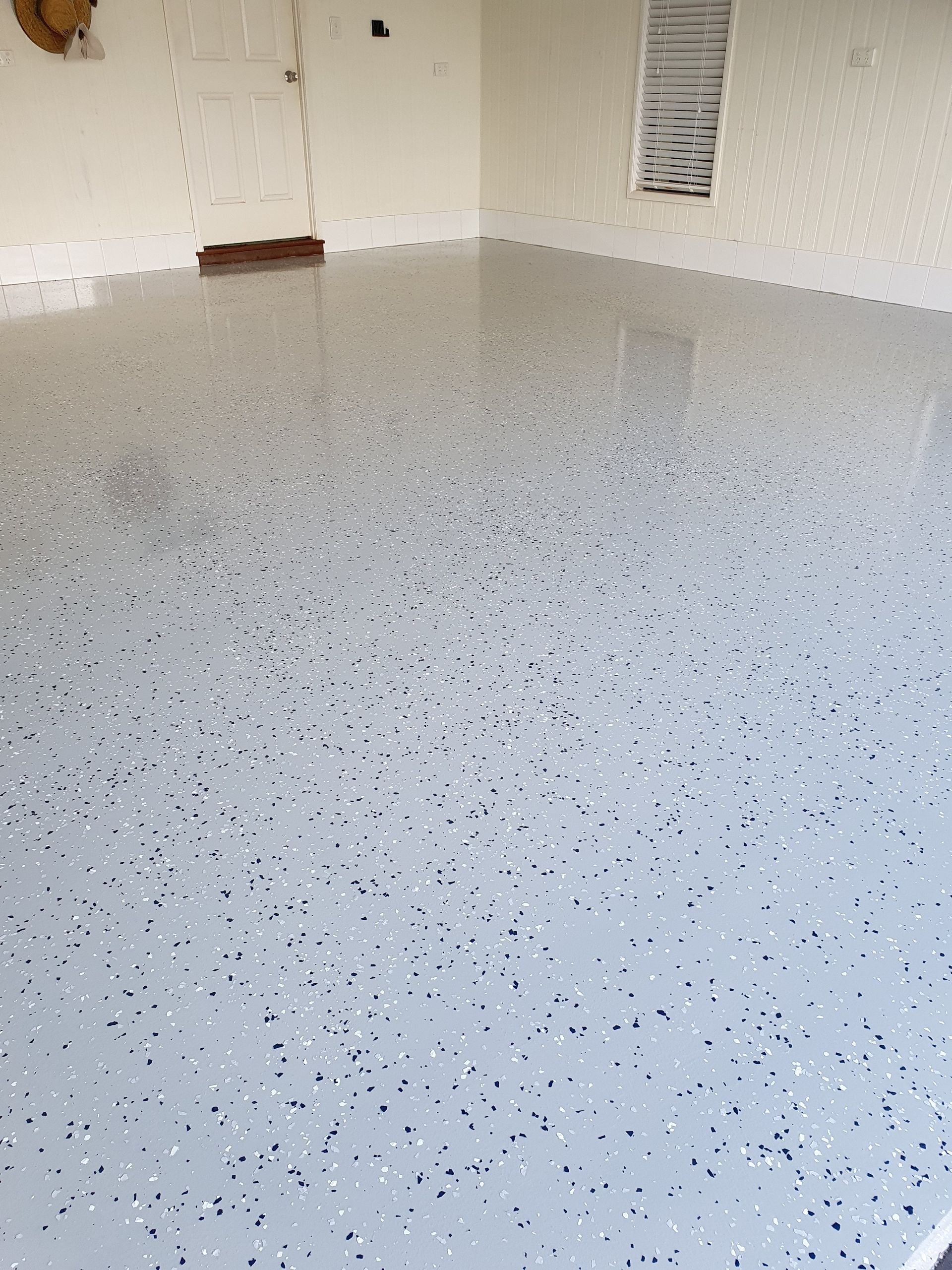 Grey Speckled Epoxy Garage Floor — Keppel Coatings in Pacific Heights, QLD