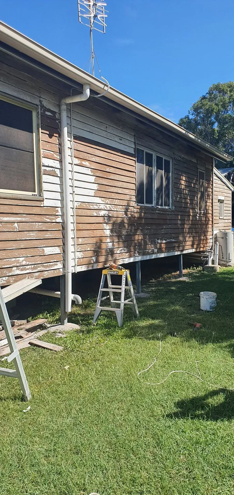 House Exterior, Wood Siding, Paint Peeling — Keppel Coatings in Pacific Heights, QLD