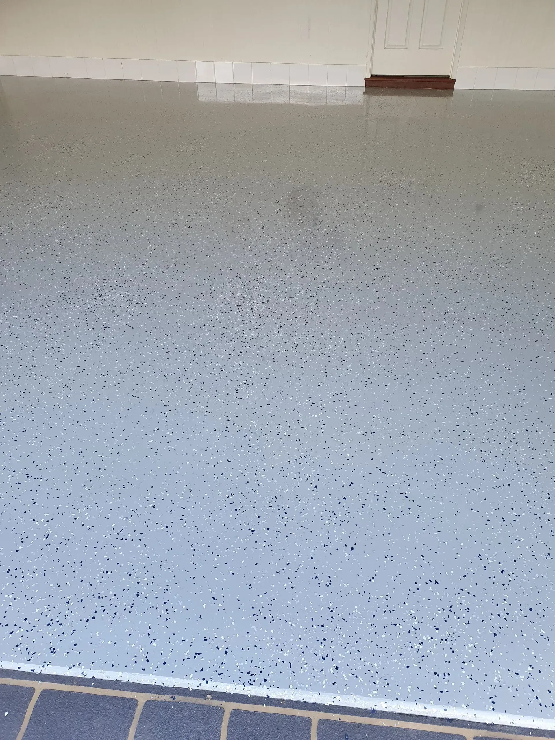 Gray Speckled Epoxy Garage Floor — Keppel Coatings in Pacific Heights, QLD
