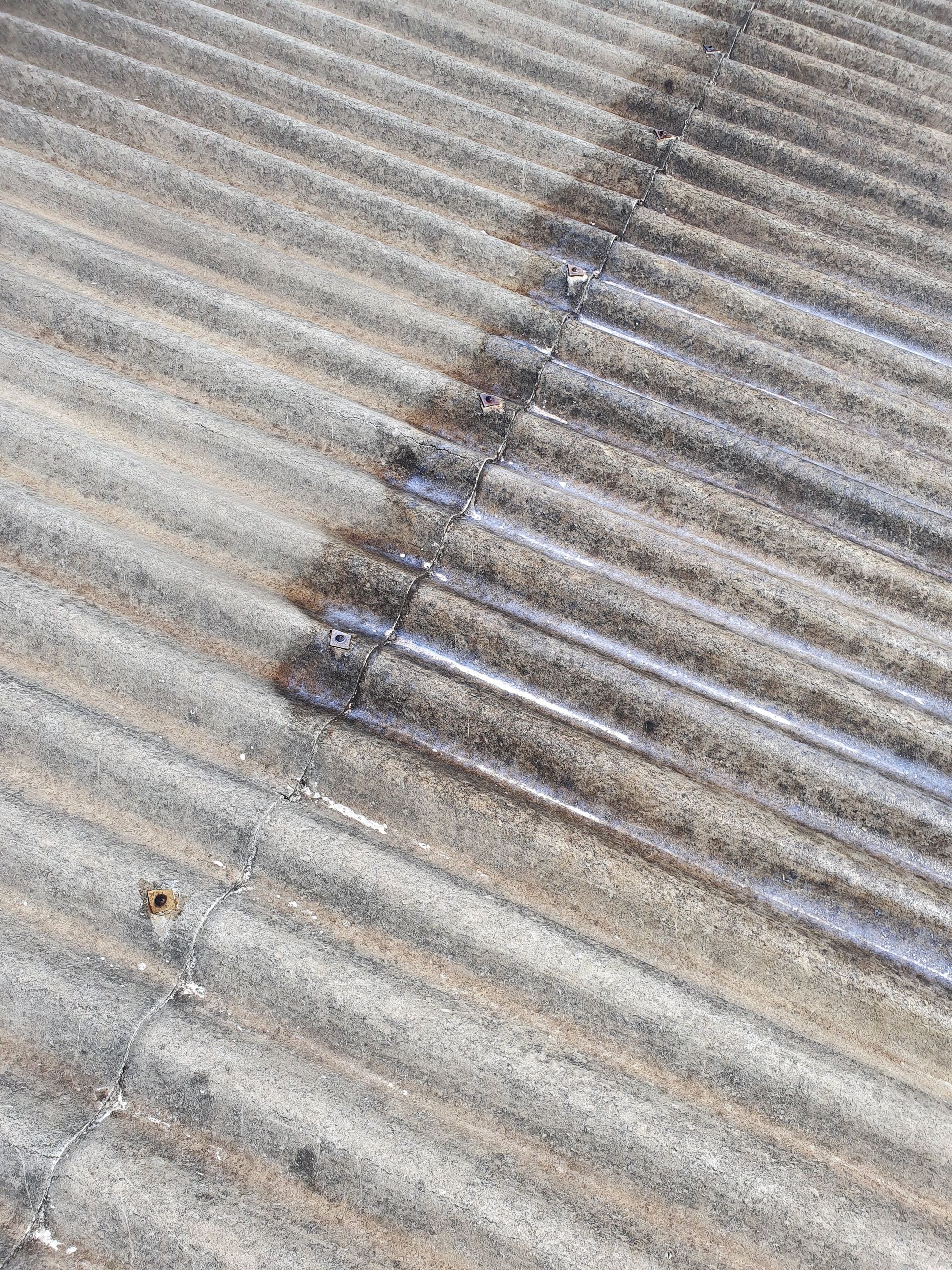 Corrugated Metal Roof, Weathered and Discolored — Keppel Coatings in Pacific Heights, QLD