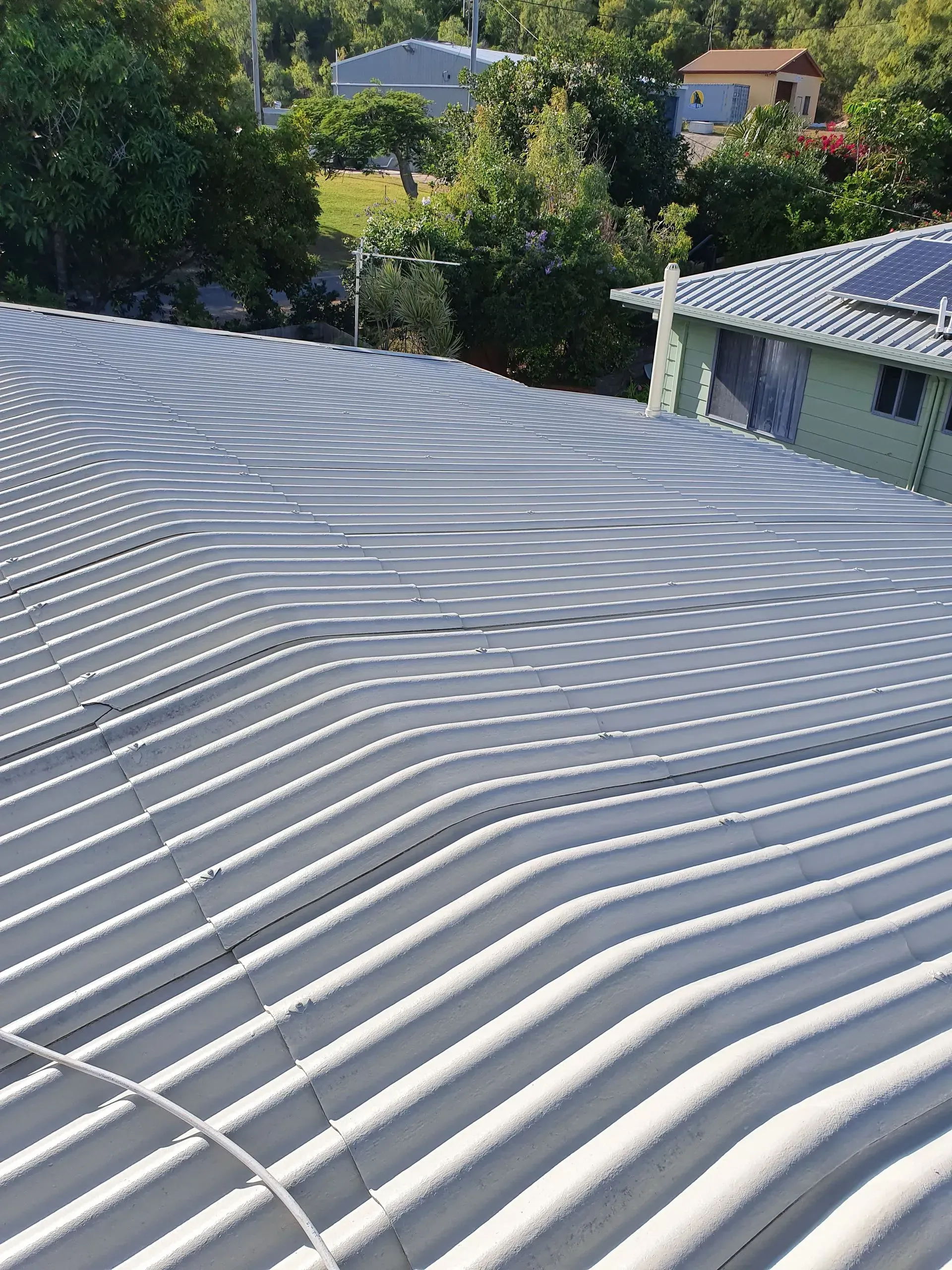 Corrugated Metal Roof, Gray and Wavy — Keppel Coatings in Pacific Heights, QLD