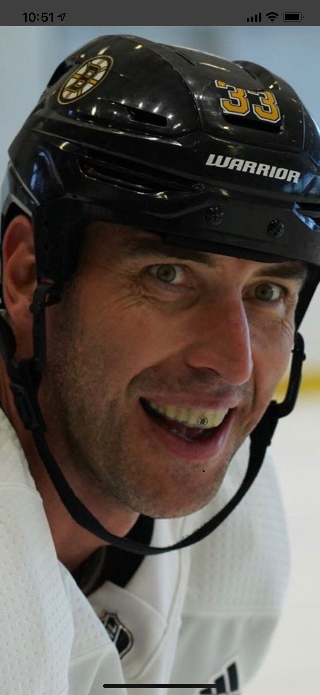 Boston Bruin player with mouth guard custom designed by Dr. Bryan Hoertdoerfer