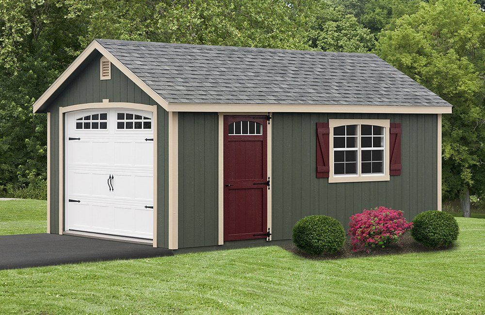 Green shed with white garage door, red door, window with shutters, and asphalt driveway.