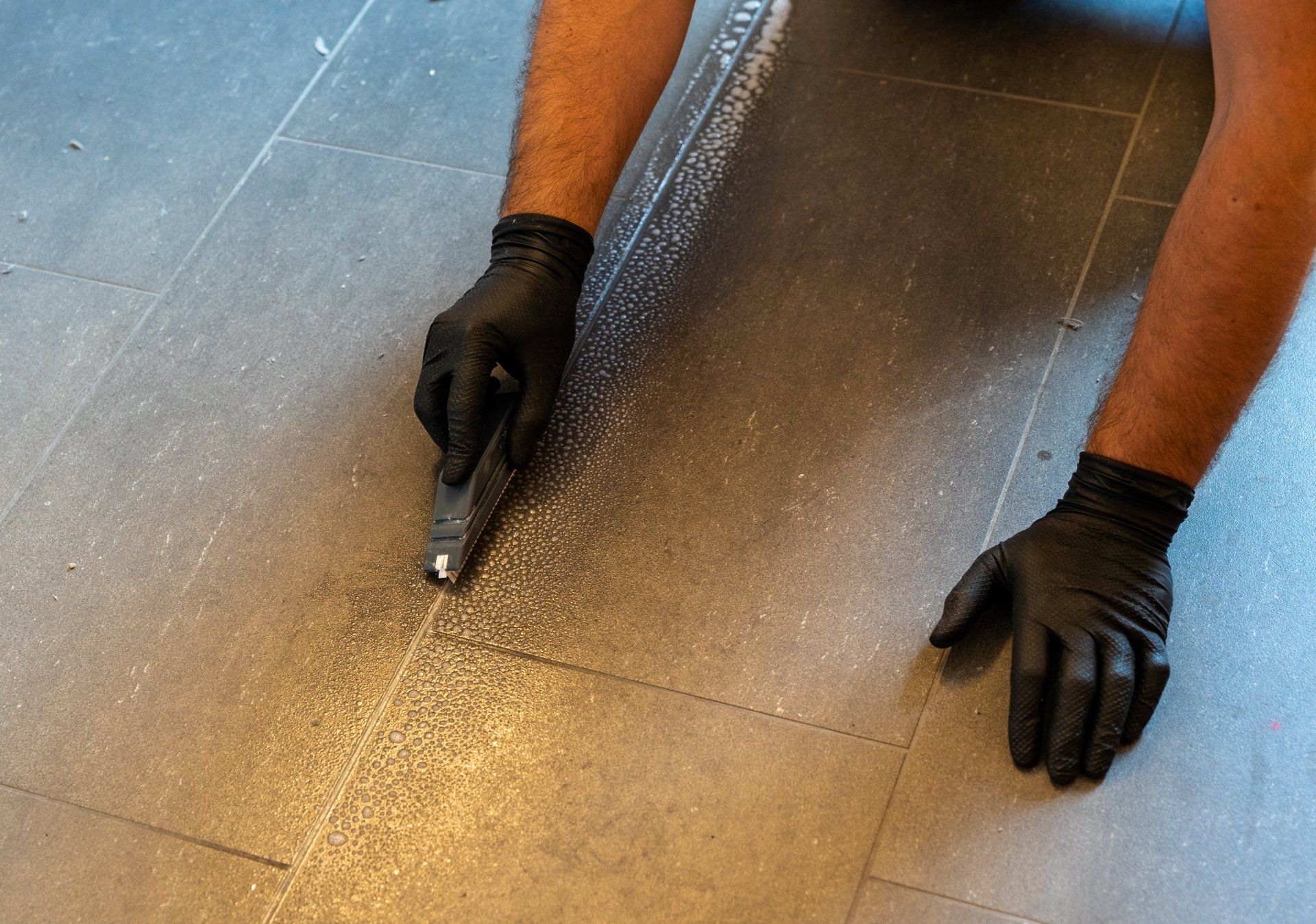 Cleaner cleaning grout — Menifee, CA — Pauls Ultra Steam cleaning