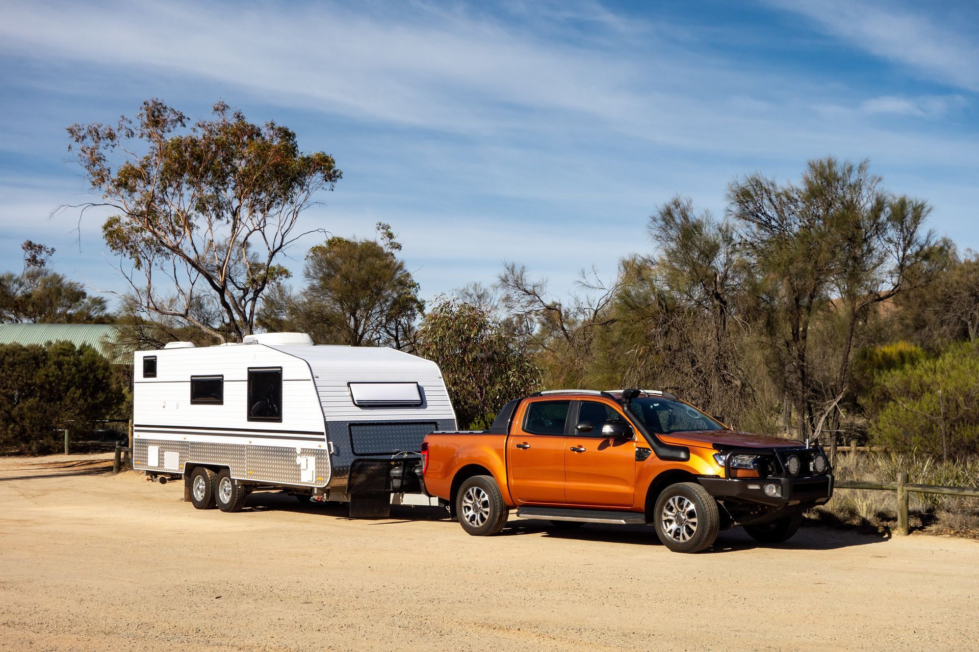 A truck with a caravan.