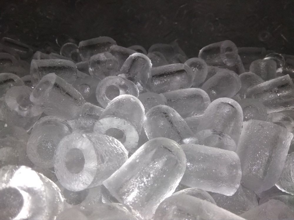 A Pile of Ice Cubes with Holes in Them - Townsville Ice Machine in Mackay, QLD