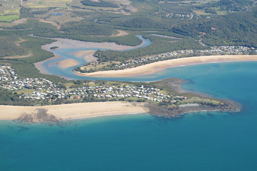 An Aerial View Of A Beach With A River Running Through It — Townsville Air-Conditioning in Mackay, QLD
