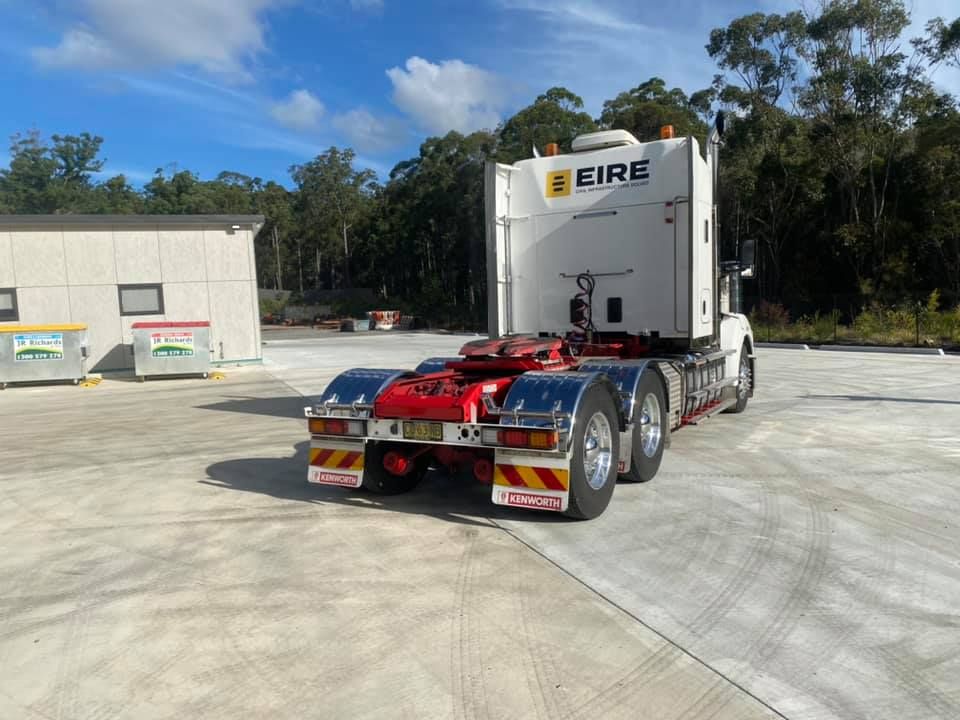 A Semi Truck is Parked in a Parking Lot Next to a Building — BDM Heavy Vehicle Repairs In Taree, NSW