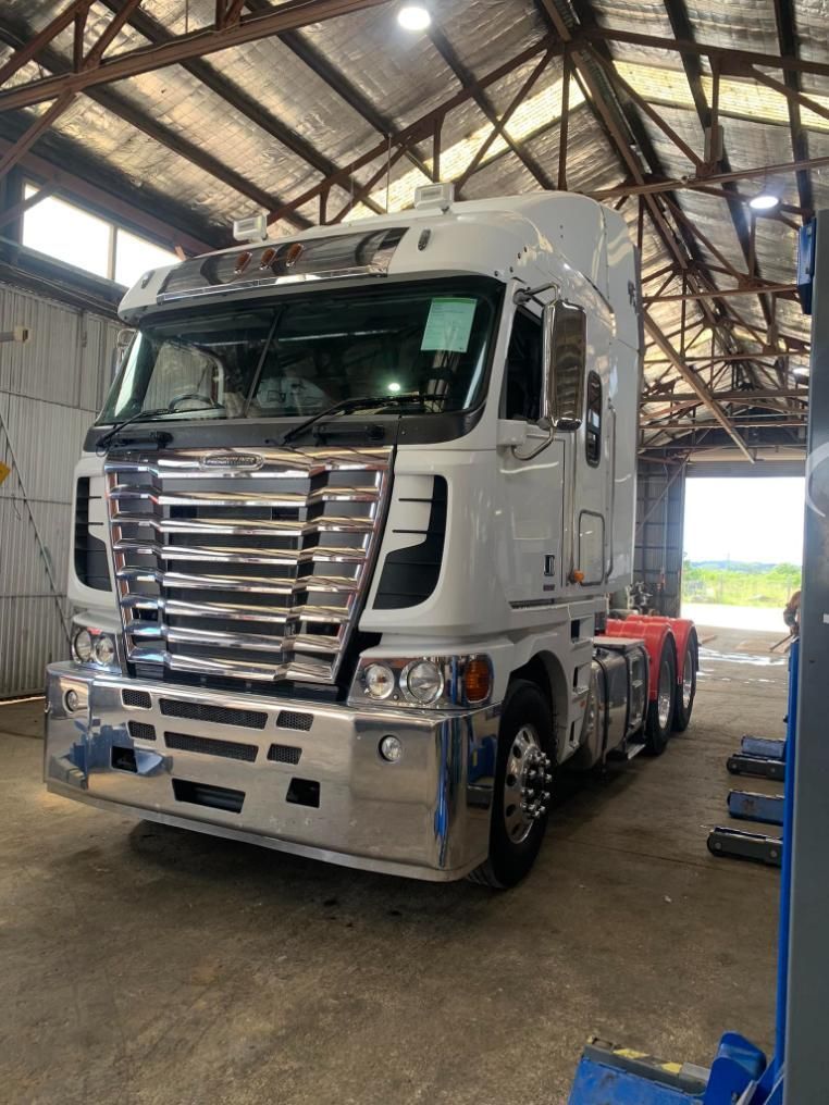 A White Semi Truck is Parked in a Garage — BDM Heavy Vehicle Repairs In Wauchope, NSW