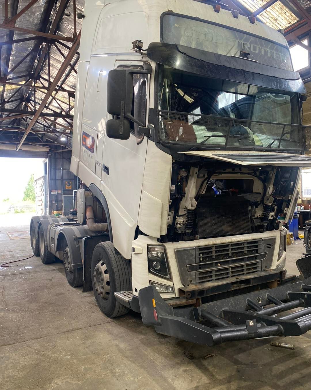 White Semi-truck With Its Hood Open, Likely In A Repair Shop — BDM Heavy Vehicle Repairs In Wauchope, NSW