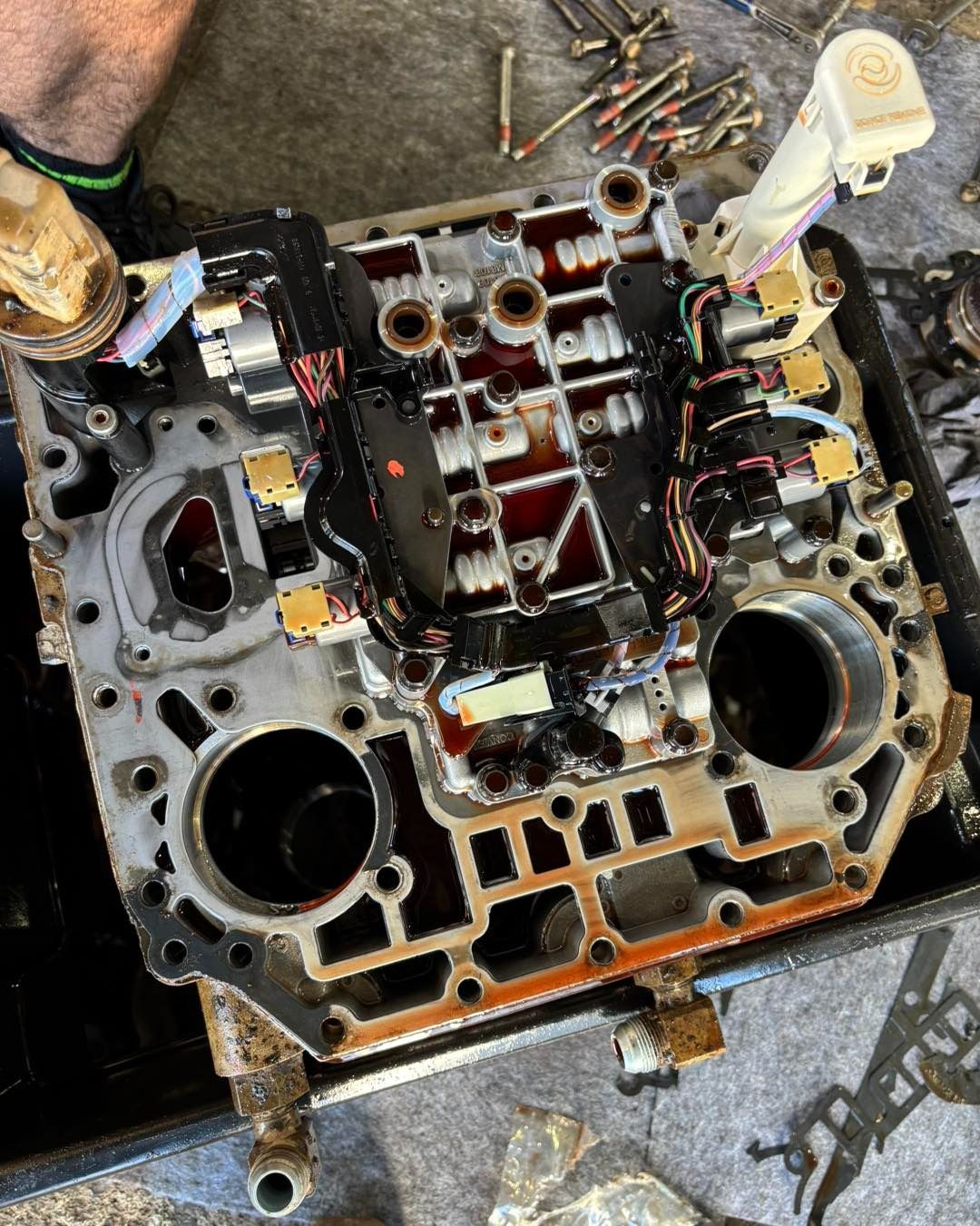 A Man is Working on a Car Engine in a Garage — BDM Heavy Vehicle Repairs In Wauchope, NSW