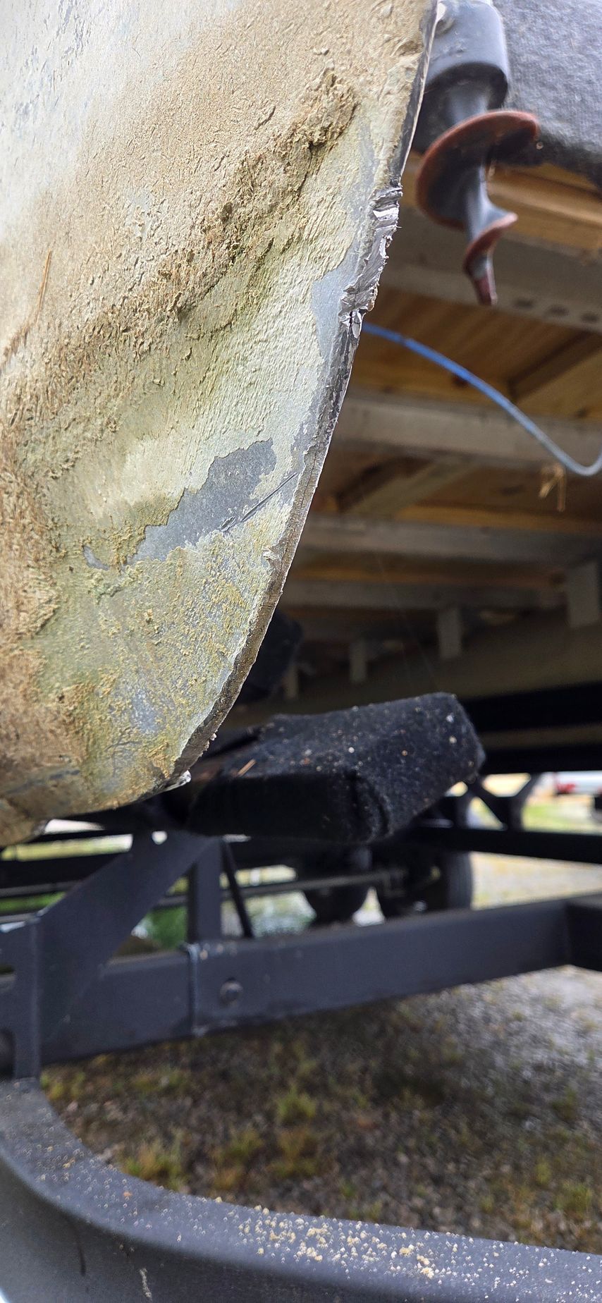 A close up of the underside of a boat.