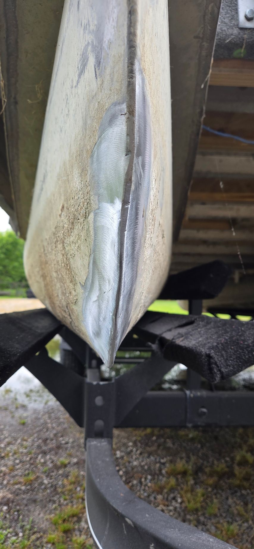 A boat is sitting on top of a trailer.