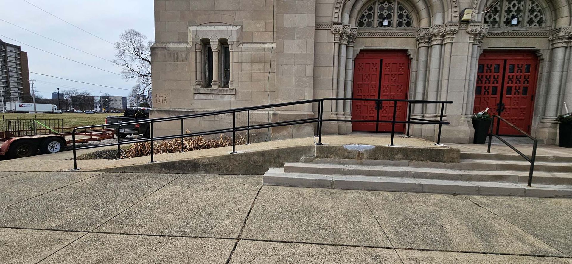 There is a ramp leading to the front of a church.