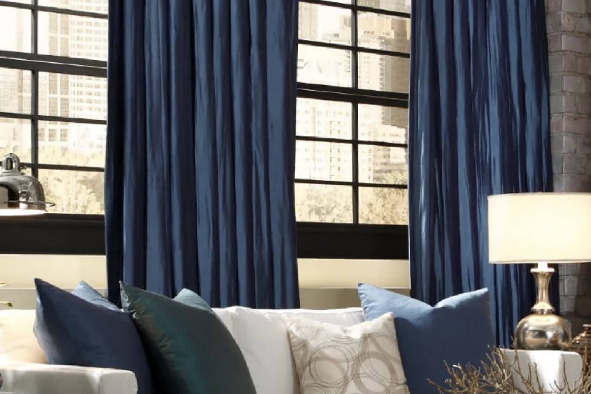 Navy blue Carole Fabrics™ Custom Drapes in a traditional living room near Houston, TX