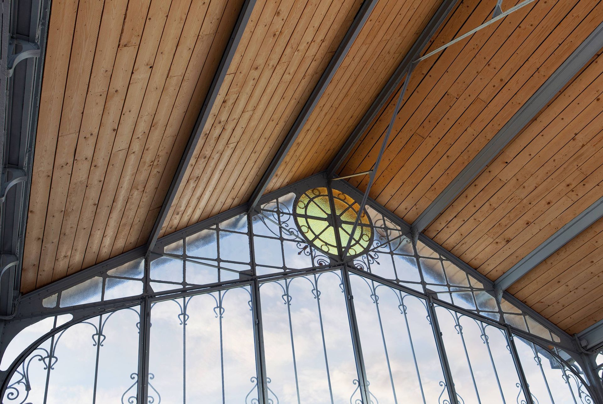 Beautiful black faux iron detailing on a large window of a commercial business near Houston, TX