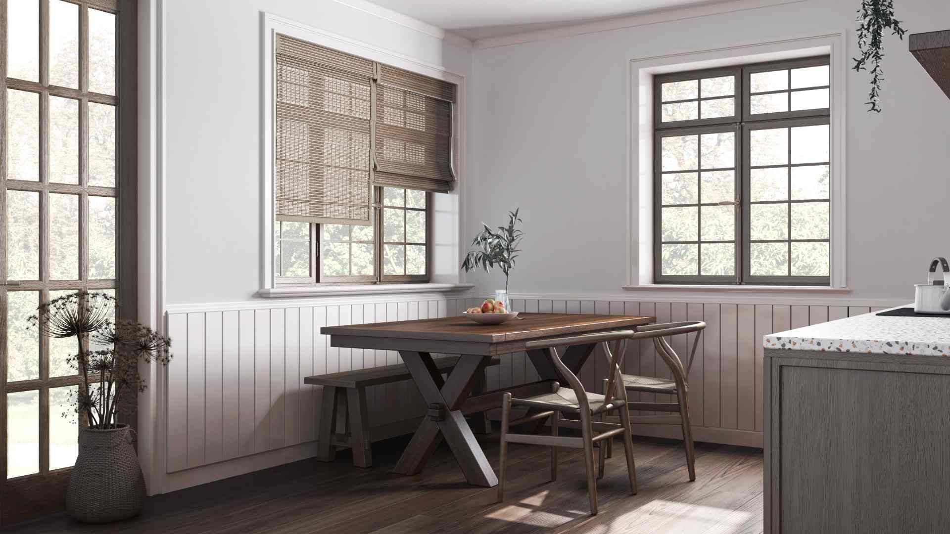 Farmhouse window treatments on a window above a long table with two chairs and a bench near Houston