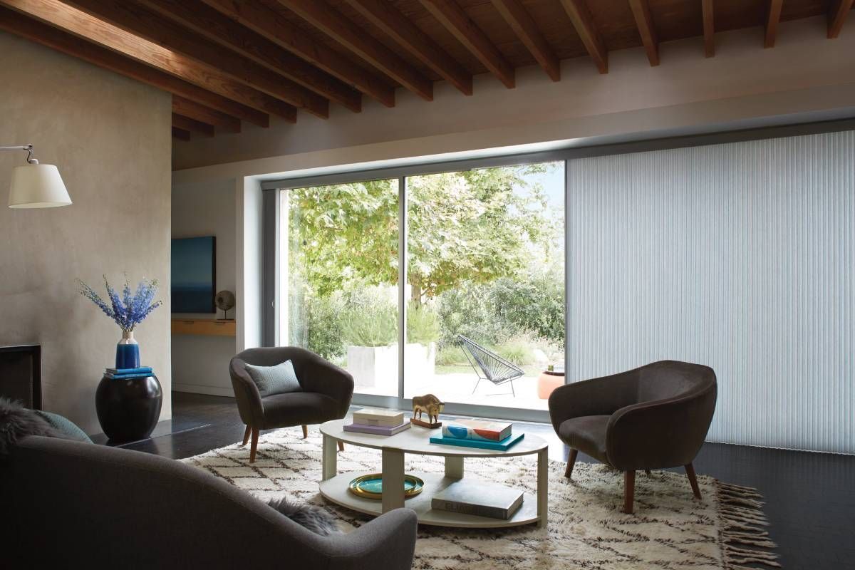 Hunter Douglas Duette® Cellular Shades covering a sliding glass door in a home near Houston, TX