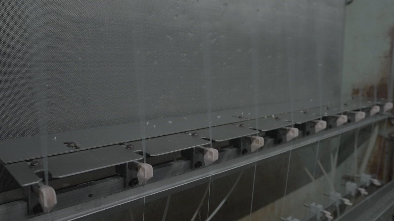 A close up of a conveyor belt in a factory.