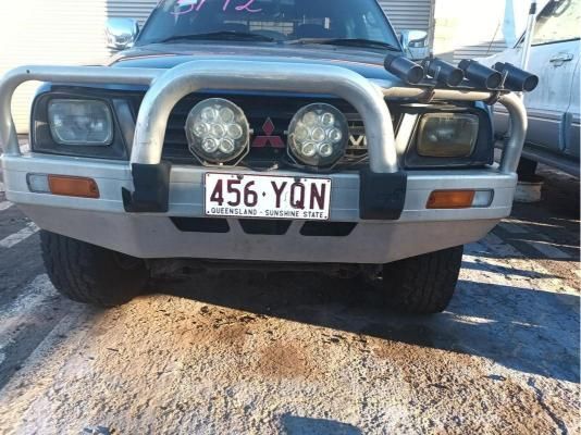 A Car With a License Plate That Says 456 Yon — South West 4WD Wreckers In Brisbane, QLD