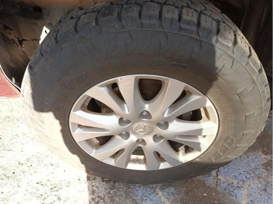 A Close Up of a Car Wheel With a Tire on It — South West 4WD Wreckers In Harristown, QLD