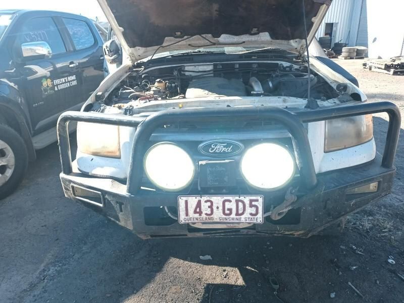A Ford Truck With the Hood Up — South West 4WD Wreckers In Harristown, QLD