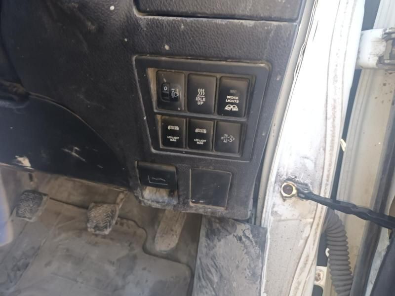 A Dirty Dashboard of a Car With a Few Buttons on It — South West 4WD Wreckers In Brisbane, QLD