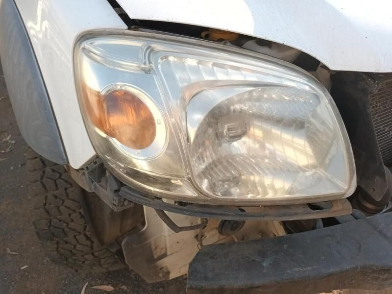 A Close Up of a Car Headlight That Has Been Damaged — South West 4WD Wreckers In Harristown, QLD