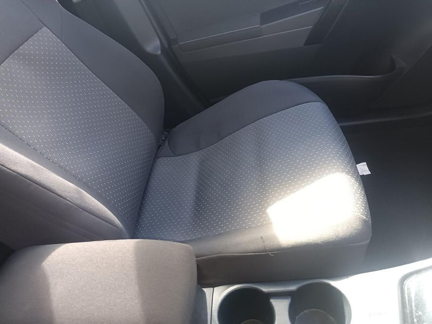 A Car Seat with an Arm Rest and a Cup Holder — South West 4WD Wreckers in Harristown, QLD