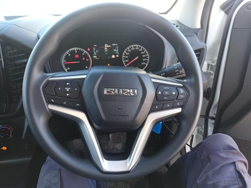 A Person is Sitting in the Driver 's Seat of an Isuzu Car — South West 4WD Wreckers In Harristown, QLD