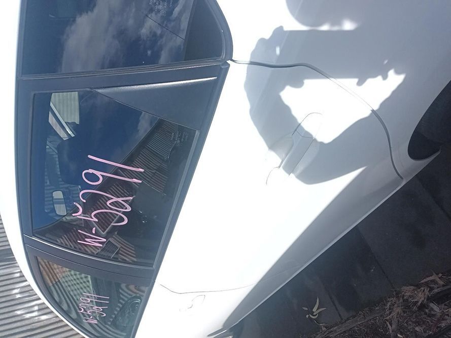 A Close Up of a White Car's Window — South West 4WD Wreckers in Harristown, QLD
