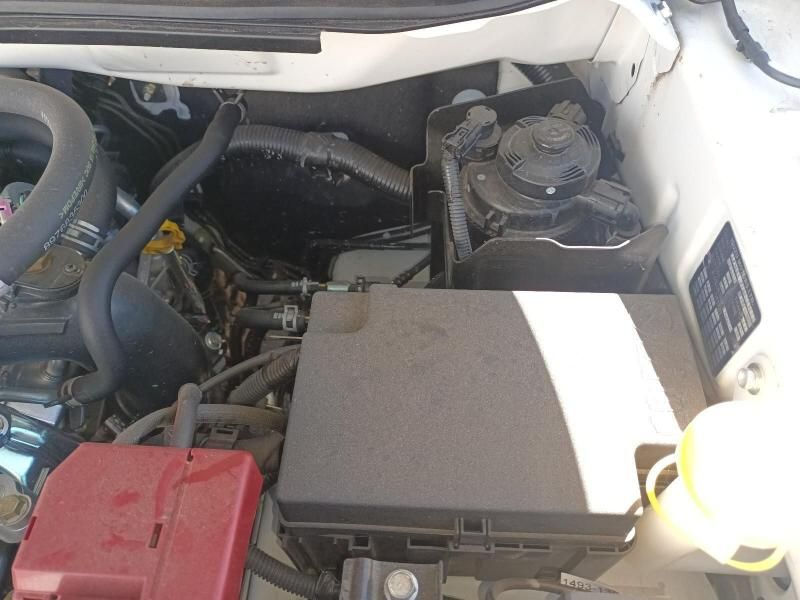 The Engine of a White Car With a Red Battery — South West 4WD Wreckers In Harristown, QLD