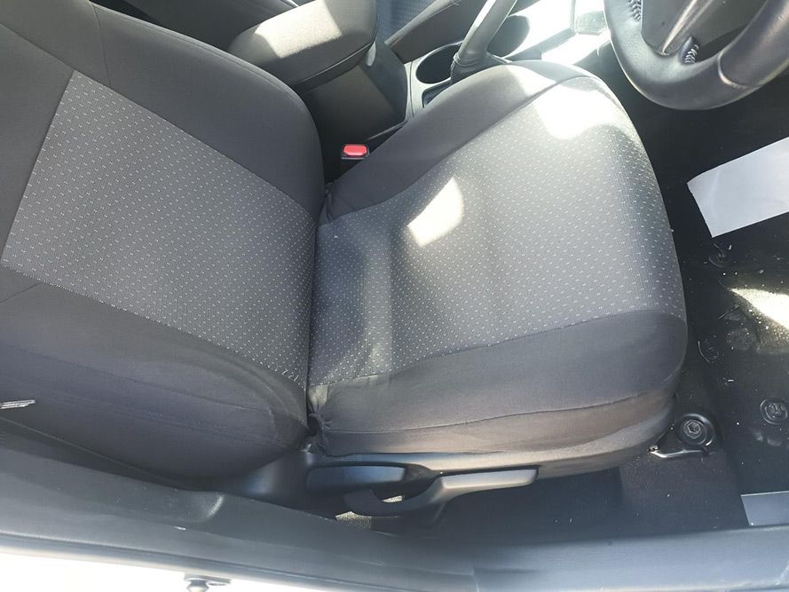 A Close Up of a Car Seat with a Steering Wheel in the Background — South West 4WD Wreckers in Harristown, QLD