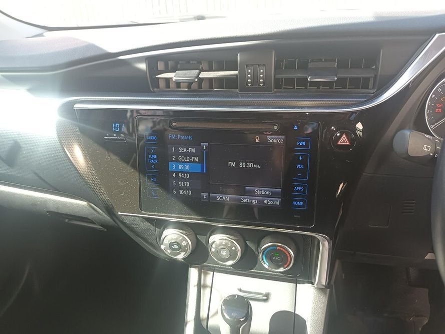 The Dashboard of a Car with a Radio on It — South West 4WD Wreckers in Harristown, QLD